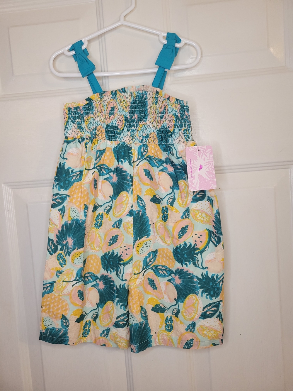 Tommy Bahama Girls Tropical Fruit Smocked Romper in Teal, Yellow & Peach - Picture 2 of 9